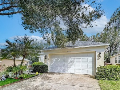 Discover 2377 Paulette Drive, situated in a sought-after gated on Southern Dunes Golf and Country Club in Florida - for sale on GolfHomes.com, golf home, golf lot