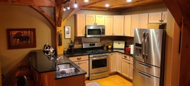 Remarkable 4 bedroom plus loft, 3 bath three-level post and beam on Mount Snow Golf Club in Vermont - for sale on GolfHomes.com, golf home, golf lot