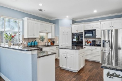 Step inside this updated custom home to the warmth and flow of on Trophy Club of Dallas in Texas - for sale on GolfHomes.com, golf home, golf lot
