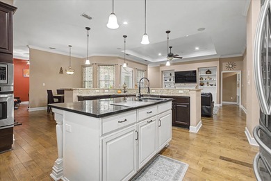 Custom-built and beautifully maintained by its original owner on Southwood Golf Club in Florida - for sale on GolfHomes.com, golf home, golf lot