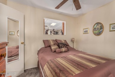 This 2 bedroom/2bath mobile home is immaculate and incredibly on Tucson Estates Golf Course in Arizona - for sale on GolfHomes.com, golf home, golf lot