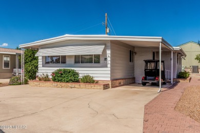 This 2 bedroom/2bath mobile home is immaculate and incredibly on Tucson Estates Golf Course in Arizona - for sale on GolfHomes.com, golf home, golf lot