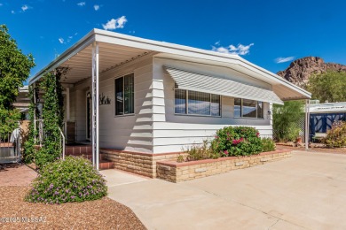 This 2 bedroom/2bath mobile home is immaculate and incredibly on Tucson Estates Golf Course in Arizona - for sale on GolfHomes.com, golf home, golf lot