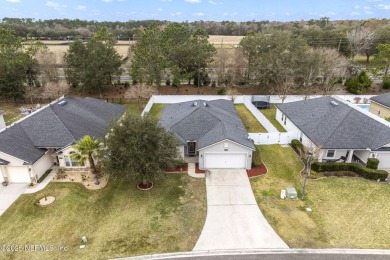 Nestled in a sought-after neighborhood, this stunning home on King and Bear Golf Course/World Golf Village in Florida - for sale on GolfHomes.com, golf home, golf lot