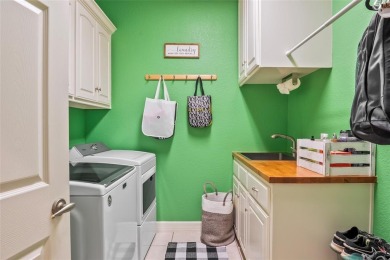 Step inside this updated custom home to the warmth and flow of on Trophy Club of Dallas in Texas - for sale on GolfHomes.com, golf home, golf lot