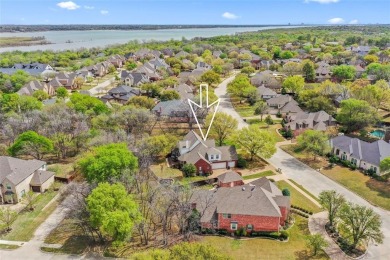 Step inside this updated custom home to the warmth and flow of on Trophy Club of Dallas in Texas - for sale on GolfHomes.com, golf home, golf lot