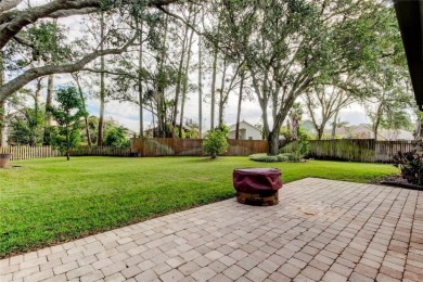 Situated in the picturesque, highly desired Glen Oaks on Countryway Golf Course in Florida - for sale on GolfHomes.com, golf home, golf lot