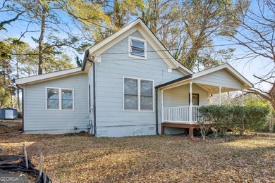 Welcome home to this bright and inviting 3-bedroom, 2-bath home on John A. White Golf Course in Georgia - for sale on GolfHomes.com, golf home, golf lot