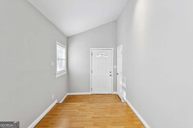 Welcome home to this bright and inviting 3-bedroom, 2-bath home on John A. White Golf Course in Georgia - for sale on GolfHomes.com, golf home, golf lot