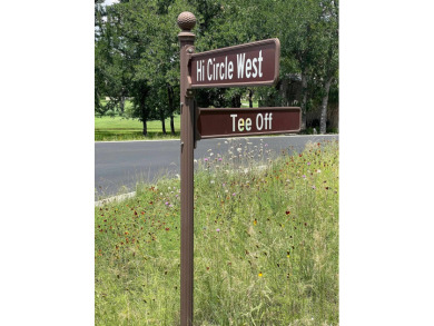 Level corner lot with trees across from Slick Rock Golf Course on Slick Rock Golf Course - Horseshoe Bay in Texas - for sale on GolfHomes.com, golf home, golf lot