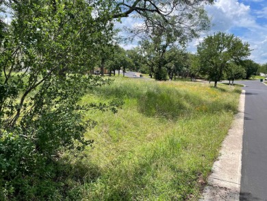 Level corner lot with trees across from Slick Rock Golf Course on Slick Rock Golf Course - Horseshoe Bay in Texas - for sale on GolfHomes.com, golf home, golf lot