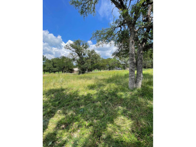 Level corner lot with trees across from Slick Rock Golf Course on Slick Rock Golf Course - Horseshoe Bay in Texas - for sale on GolfHomes.com, golf home, golf lot