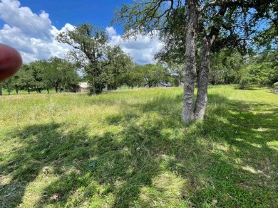 Level corner lot with trees across from Slick Rock Golf Course on Slick Rock Golf Course - Horseshoe Bay in Texas - for sale on GolfHomes.com, golf home, golf lot