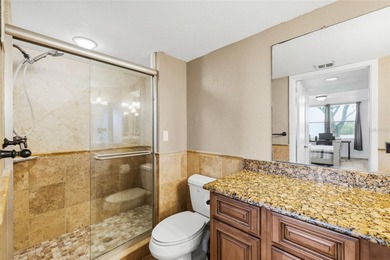 Live where the golf course meets the coast! This stunningly on Feather Sound Country Club in Florida - for sale on GolfHomes.com, golf home, golf lot