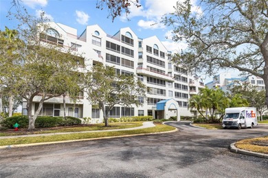 Live where the golf course meets the coast! This stunningly on Feather Sound Country Club in Florida - for sale on GolfHomes.com, golf home, golf lot