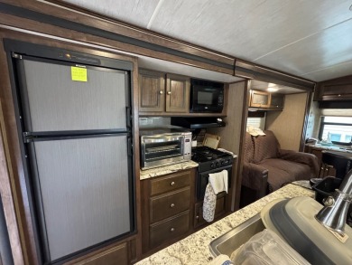 Lot with lots of extras.  Camper included is in great condition on Captains Cove Golf and Yacht Club in Virginia - for sale on GolfHomes.com, golf home, golf lot