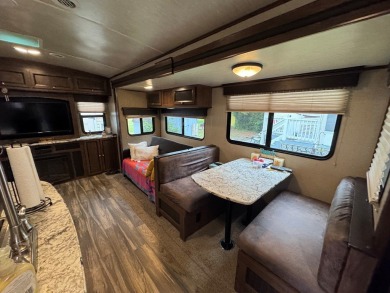 Lot with lots of extras.  Camper included is in great condition on Captains Cove Golf and Yacht Club in Virginia - for sale on GolfHomes.com, golf home, golf lot
