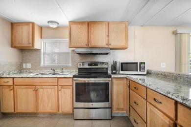 Check out this adorable cute and cozy, 3 Bedrooms 2 bath double on Brookridge Country Club in Florida - for sale on GolfHomes.com, golf home, golf lot