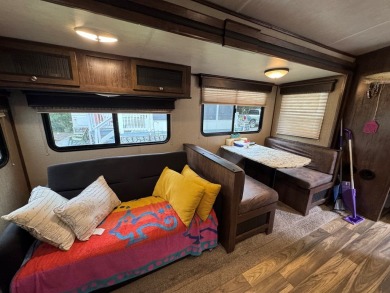 Lot with lots of extras.  Camper included is in great condition on Captains Cove Golf and Yacht Club in Virginia - for sale on GolfHomes.com, golf home, golf lot