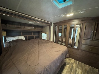 Lot with lots of extras.  Camper included is in great condition on Captains Cove Golf and Yacht Club in Virginia - for sale on GolfHomes.com, golf home, golf lot