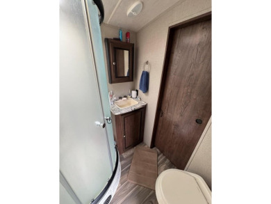 Lot with lots of extras.  Camper included is in great condition on Captains Cove Golf and Yacht Club in Virginia - for sale on GolfHomes.com, golf home, golf lot