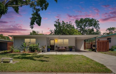 Welcome to this beautifully updated 3-bedroom, 2-bathroom on The Dunedin Country Club in Florida - for sale on GolfHomes.com, golf home, golf lot