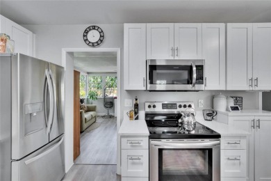 Welcome to this beautifully updated 3-bedroom, 2-bathroom on The Dunedin Country Club in Florida - for sale on GolfHomes.com, golf home, golf lot