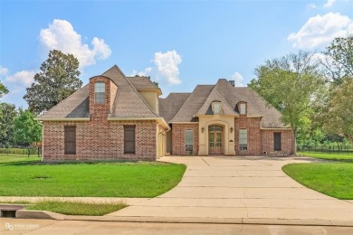Elegant 4BR 3BA 2Half Bath home with 3,677 sq ft in the on The Golf Club At StoneBridge in Louisiana - for sale on GolfHomes.com, golf home, golf lot