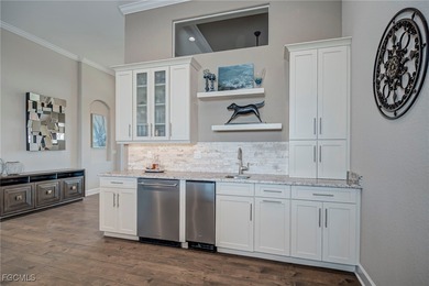 Enjoy luxury living with golf course views, southwestern on Royal Tee Country Club in Florida - for sale on GolfHomes.com, golf home, golf lot