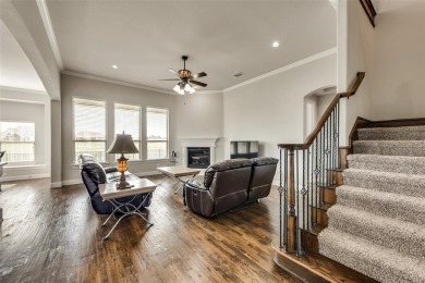Elegant 1.5-story home at 2000 Fox Bend Trace in the Bridges at on The Bridges Golf Club in Texas - for sale on GolfHomes.com, golf home, golf lot