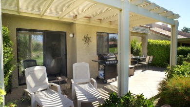 Nestled in the highly sought-after gated community of Palm on Palm Desert Resort Country Club in California - for sale on GolfHomes.com, golf home, golf lot
