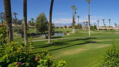 Nestled in the highly sought-after gated community of Palm on Palm Desert Resort Country Club in California - for sale on GolfHomes.com, golf home, golf lot