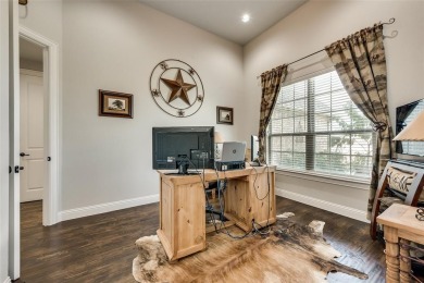 Elegant 1.5-story home at 2000 Fox Bend Trace in the Bridges at on The Bridges Golf Club in Texas - for sale on GolfHomes.com, golf home, golf lot