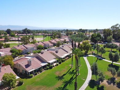 Nestled in the highly sought-after gated community of Palm on Palm Desert Resort Country Club in California - for sale on GolfHomes.com, golf home, golf lot