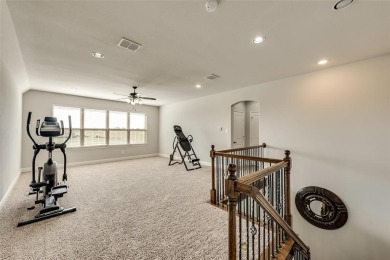 Elegant 1.5-story home at 2000 Fox Bend Trace in the Bridges at on The Bridges Golf Club in Texas - for sale on GolfHomes.com, golf home, golf lot