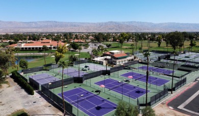 Nestled in the highly sought-after gated community of Palm on Palm Desert Resort Country Club in California - for sale on GolfHomes.com, golf home, golf lot