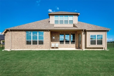 Elegant 1.5-story home at 2000 Fox Bend Trace in the Bridges at on The Bridges Golf Club in Texas - for sale on GolfHomes.com, golf home, golf lot