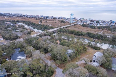 Welcome to your waterfront coastal retreat & island living! on Founders Club At St. James Plantation in North Carolina - for sale on GolfHomes.com, golf home, golf lot