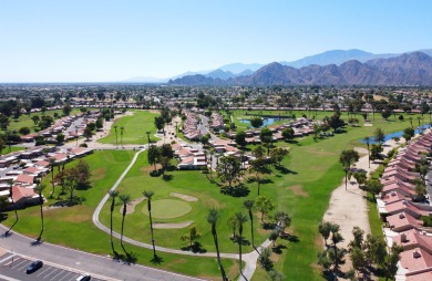 Nestled in the highly sought-after gated community of Palm on Palm Desert Resort Country Club in California - for sale on GolfHomes.com, golf home, golf lot