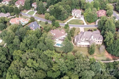 Stunning Private Estate on fairly flat lot overlooking over the on Firethorne Country Club in North Carolina - for sale on GolfHomes.com, golf home, golf lot