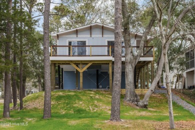 Welcome to your waterfront coastal retreat & island living! on Founders Club At St. James Plantation in North Carolina - for sale on GolfHomes.com, golf home, golf lot