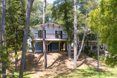 Welcome to your waterfront coastal retreat & island living! on Founders Club At St. James Plantation in North Carolina - for sale on GolfHomes.com, golf home, golf lot