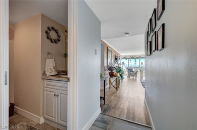 EXPERIENCE ELEVATED LIVING IN THIS HIGHLY FAVORED *H* UNIT AT on Las Vegas Country Club in Nevada - for sale on GolfHomes.com, golf home, golf lot