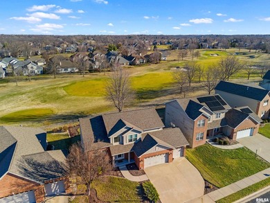Welcome to this pristine 4-bedroom, 3.5 bathroom residence on WeaverRidge Golf Club in Illinois - for sale on GolfHomes.com, golf home, golf lot