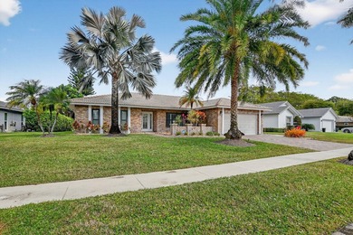 Totally renovated and a delight to see. Picture perfect and move on Boca Greens Country Club in Florida - for sale on GolfHomes.com, golf home, golf lot