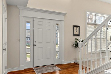 Welcome to this pristine 4-bedroom, 3.5 bathroom residence on WeaverRidge Golf Club in Illinois - for sale on GolfHomes.com, golf home, golf lot