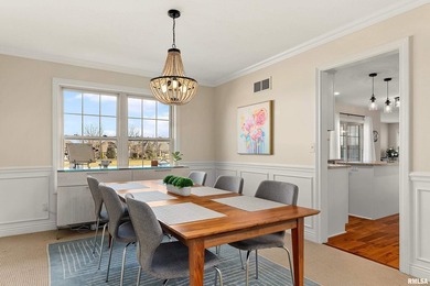 Welcome to this pristine 4-bedroom, 3.5 bathroom residence on WeaverRidge Golf Club in Illinois - for sale on GolfHomes.com, golf home, golf lot