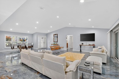 Totally renovated and a delight to see.  Picture perfect and on Boca Greens Country Club in Florida - for sale on GolfHomes.com, golf home, golf lot