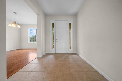 Welcome into this Hanover Model featuring 3 bedrooms, 2 full on Stone Creek Golf Club in Florida - for sale on GolfHomes.com, golf home, golf lot