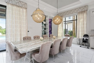 Welcome to a spectacular luxury residence in the prestigious on ChampionsGate Golf Resort in Florida - for sale on GolfHomes.com, golf home, golf lot